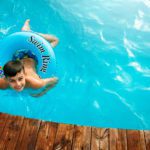 Boy Swim Safely in Pool